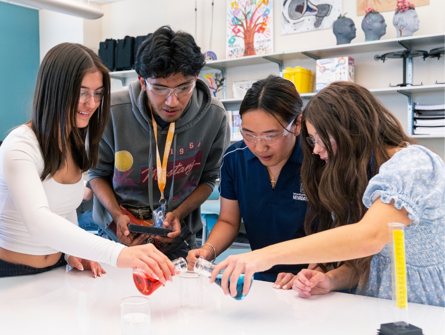 NevadaTeach students doing an experiment in a lab.